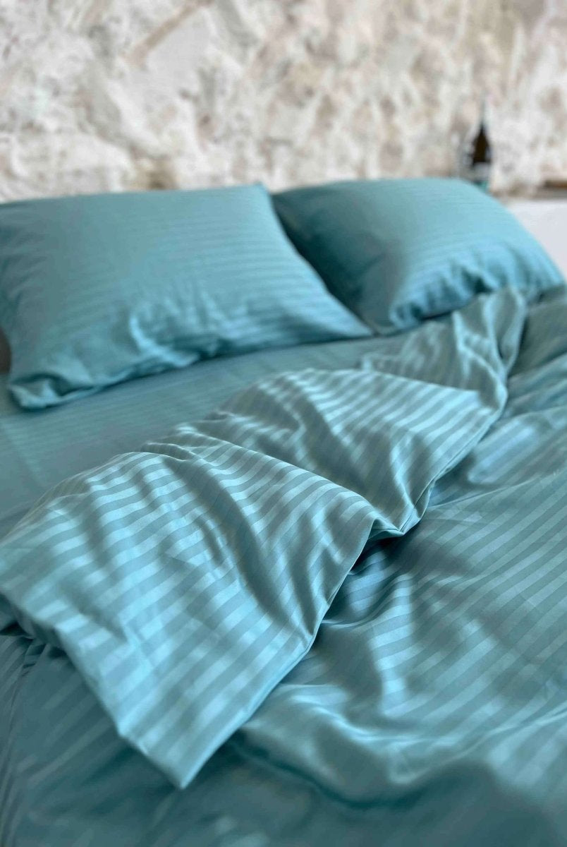 Literie en satin à rayures turquoise