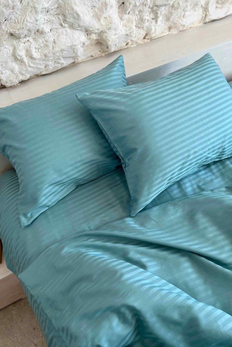 Literie en satin à rayures turquoise